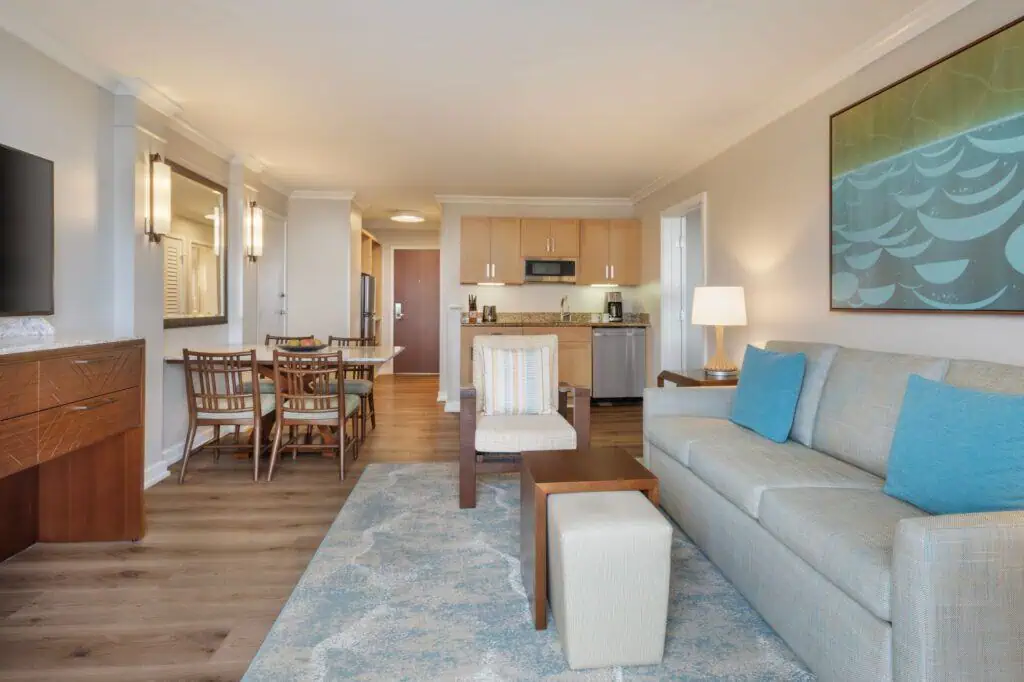 Sofa, chairs, TV, dining table, wet bar