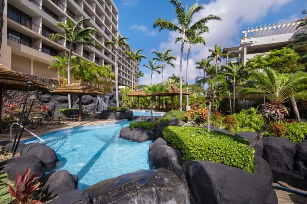 Resort exterior, outdoor pool, umbrellas