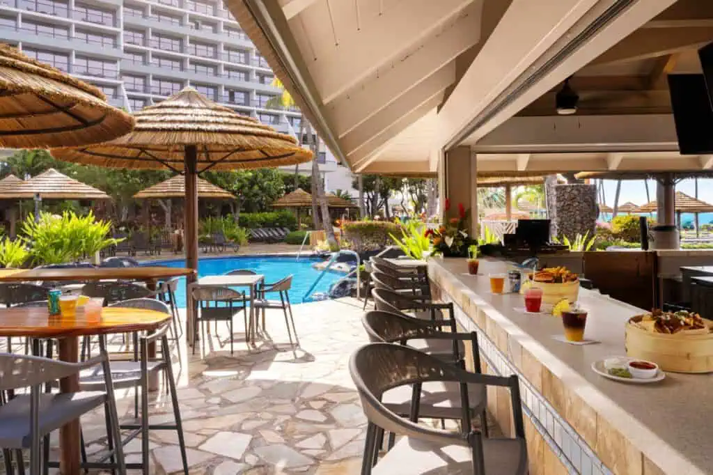 Outdoor bar by pool, food, drinks