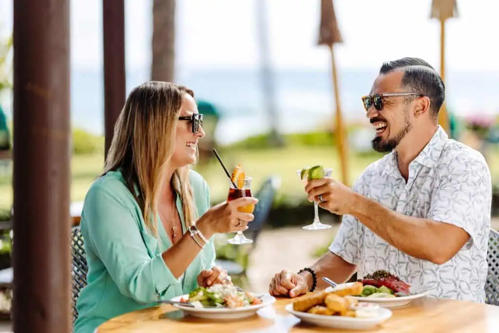 Man and woman eating lunch outdoors