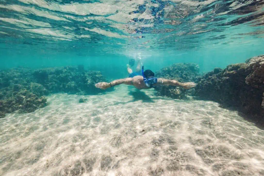 Man snorkeling in ocean in Ka'anapali Beach