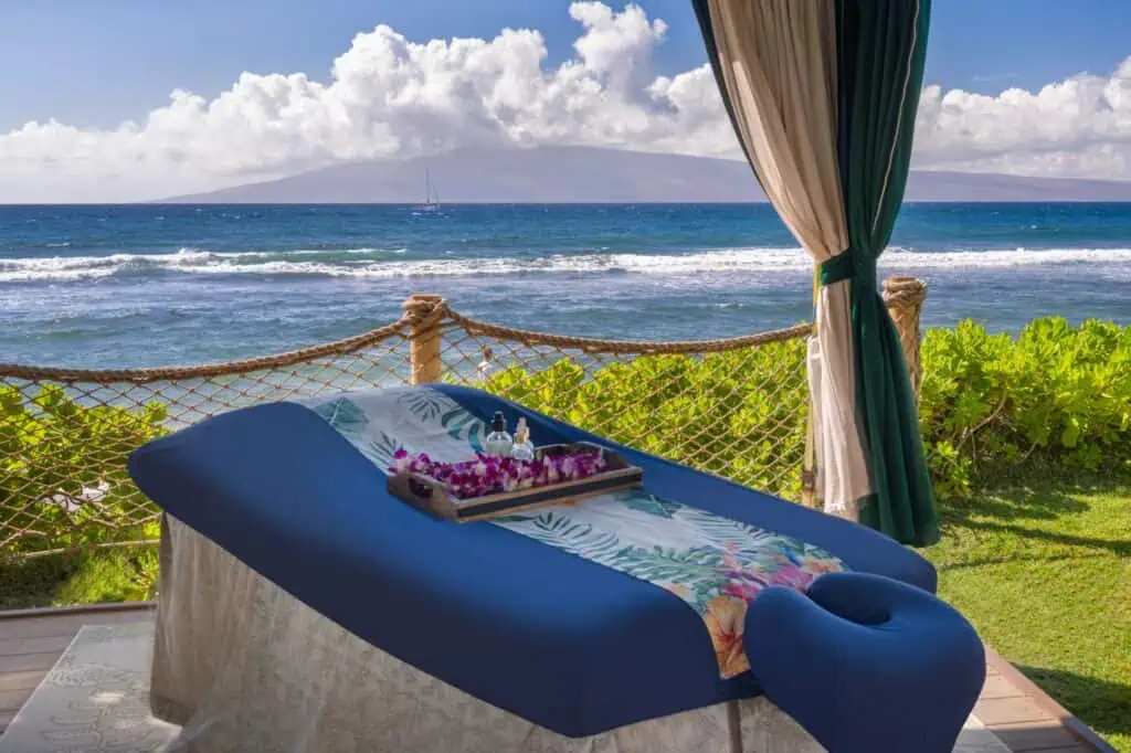 Outdoor massage table in beachside cabana