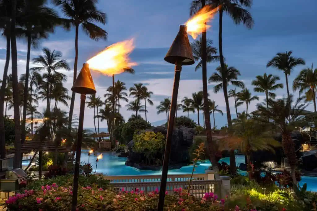 Tiki torches in evening