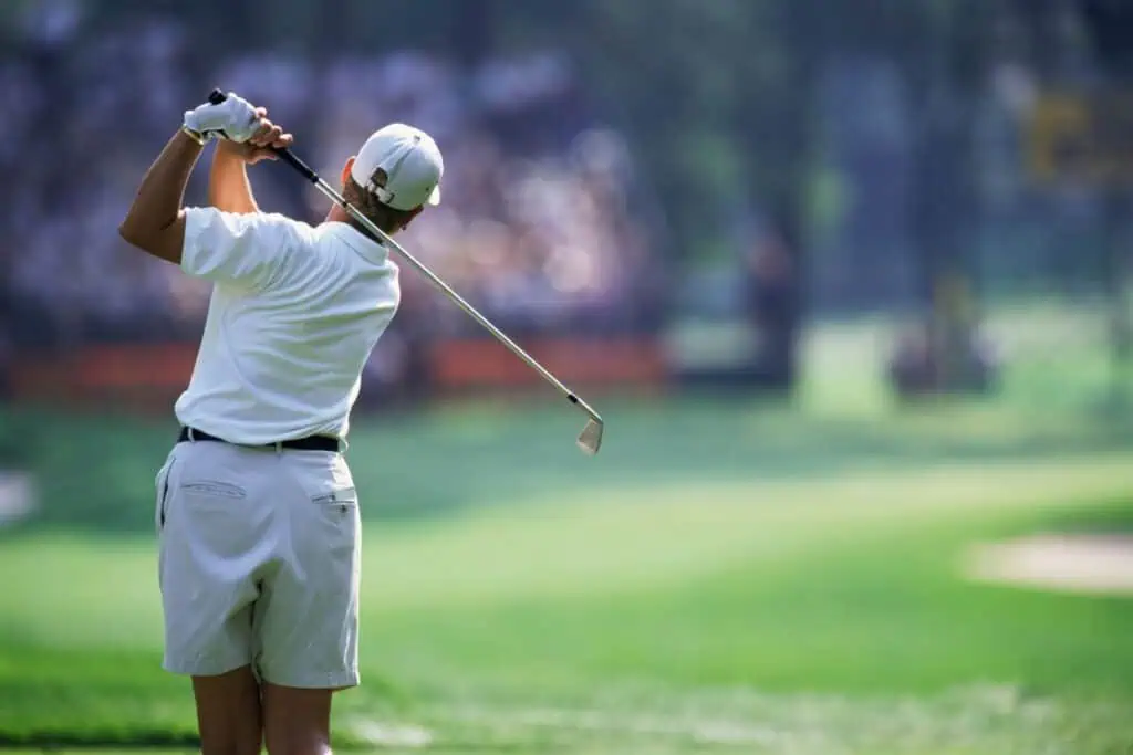 Golf player at local course in Maui, Hawaii