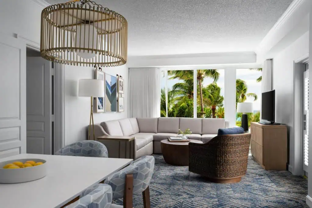 Living room with sofa, dining table, TV