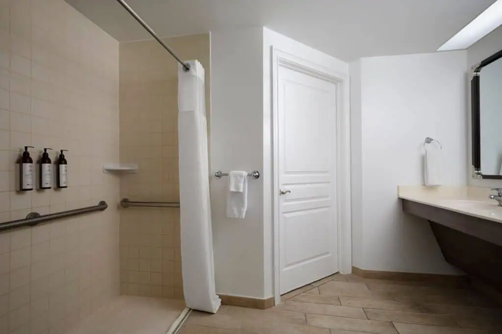 Accessible bathroom, roll-in shower, grab rails
