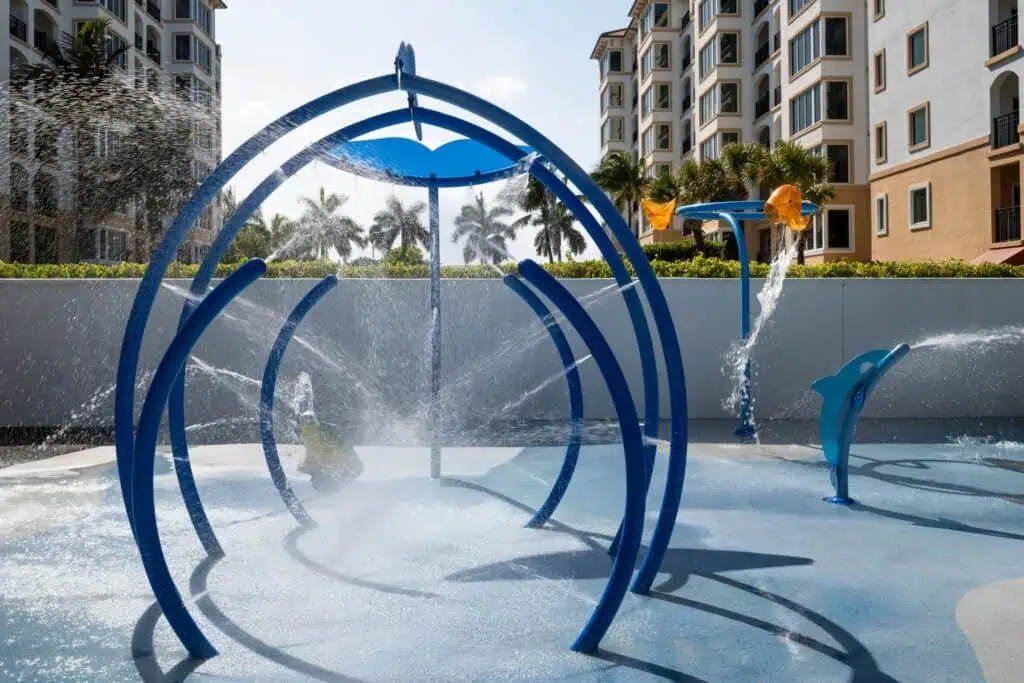 Kids splash pad with water features and sprays
