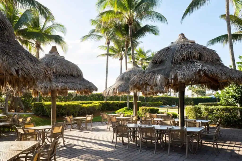 Outdoor dining tables and palapas